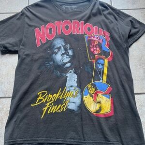 Tilly's Black Graphic Tee with Red and Yellow Accents